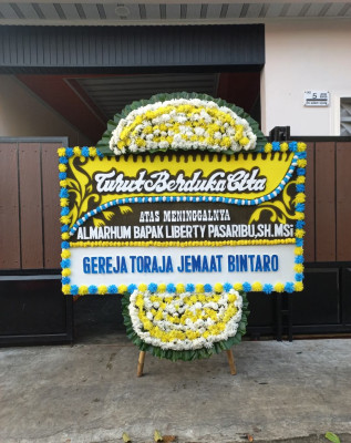 Papan Bunga Duka di Sasa